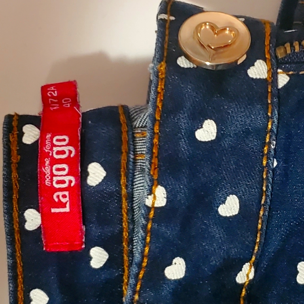 Logo heart pattern jeans like new size 7